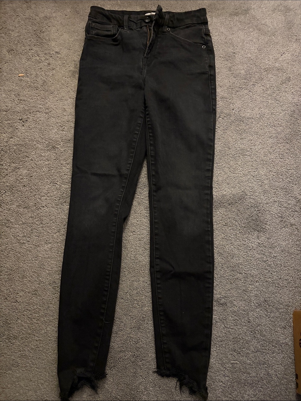 Good American Black High-Rise Skinny Jeans with Frayed Hem